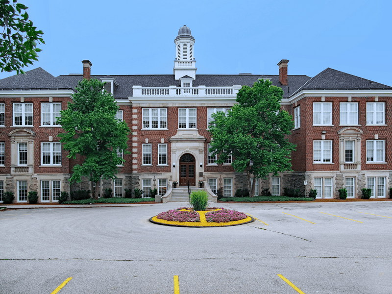 Large old fashioned brick school or college building